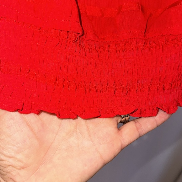 Sheer red blouse size medium with reaching at the bottom and ties on on side - Picture 8 of 8